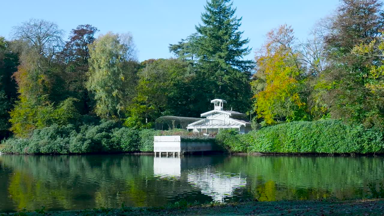 Pavilion Reflecting in Calm Lake