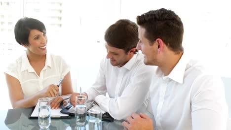 Happy-colleagues-speaking-during-a-meeting