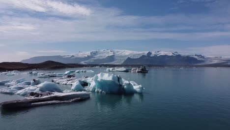 jokulsarlon glacier lagoon in iceland, aerial view over icebergs