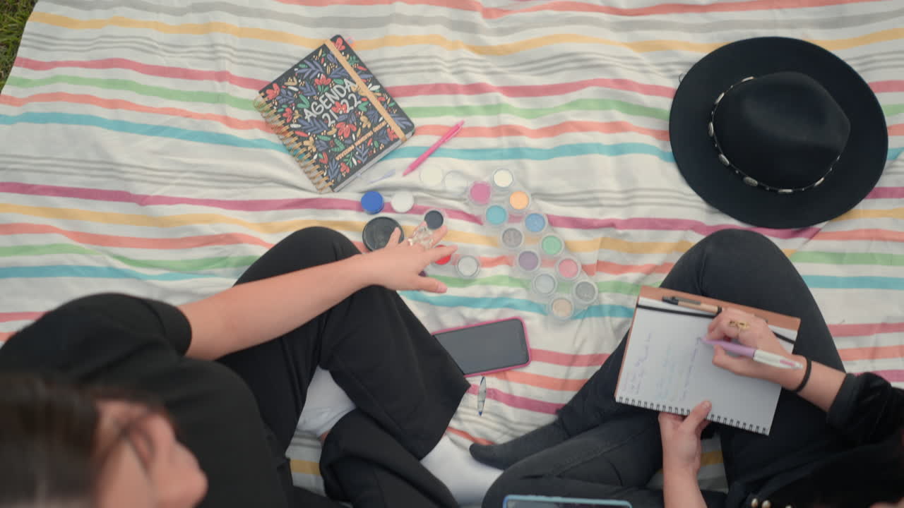 Women Collaborating on a Picnic
