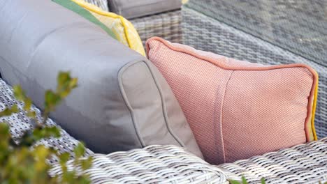 outdoor wicker furniture with colorful cushions