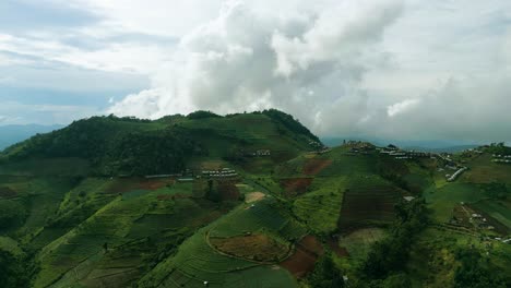 4K-Cinematic-nature-aerial-footage-of-a-drone-flying-over-the-beautiful-mountains-of-Mon-Jam-next-to-Chiang-Mai,-Thailand-on-a-sunny-day