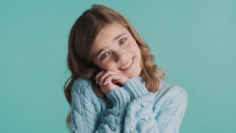 charming teenage caucasian girl in front of the camera.