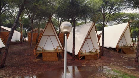 sidetracking shot of the tents for the tourist in huelva beach, spain