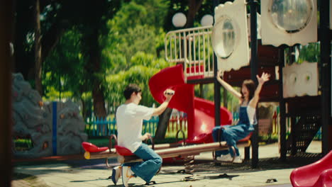 couple enjoying time at the playground