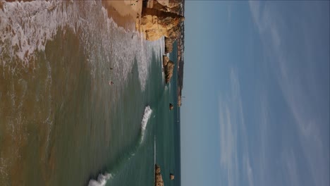 vertical slow motion view of rugged and scenic coastline of southern portugal near lagos