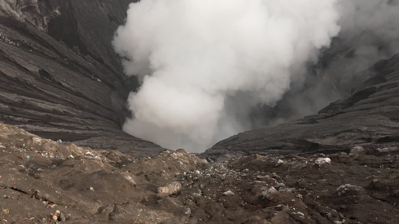 Hot sulfur steam escapes Mount Bromo active volcano Java island Indonesia geothermal activity
