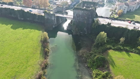 ancient bridge over river in borghetto sul mincio village in northern italy