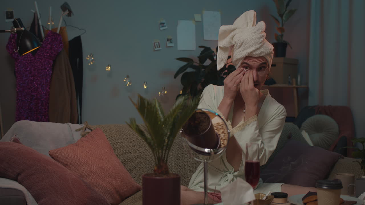 Man Pampering Himself with Skincare at Home