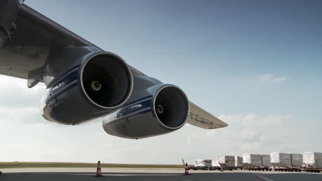 double jet engines attached to aircraft wing in cinematic backlight - engineering transport, turbine, travel concept