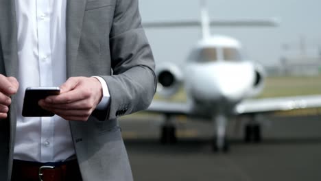 businessman using mobile phone at terminal 4k