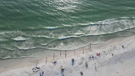 Wellen,-Sonne-Und-Spaß-Bei-Sonnenuntergang-Am-Cortez-Beach-In-Bradenton,-Florida-In-Der-Luftdrohnenansicht