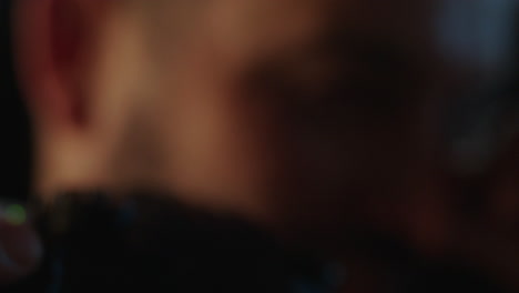 close-up of hands holding a camera