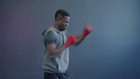 man boxing training session