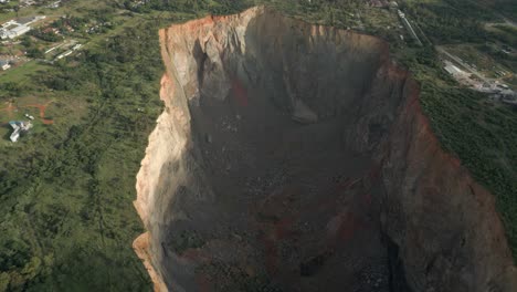 Looking-down-into-deep,-steep-sided-kimberlite-pipe-open-pit-mine