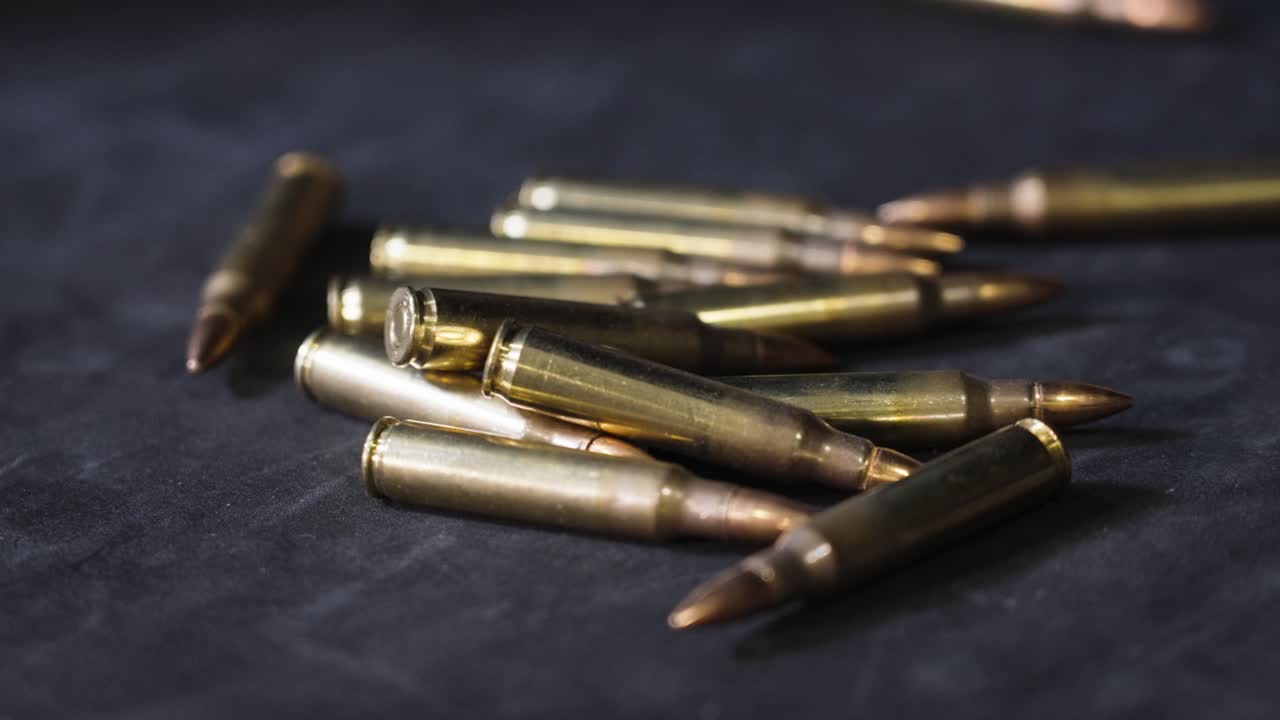 A single round of ammo rolls to the pile.