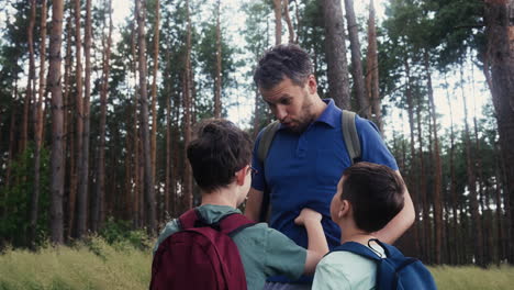 Man-and-children-at-the-forest