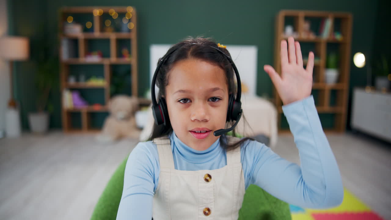 Girl with headset at home learning online