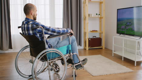 paralysed young man watching tv