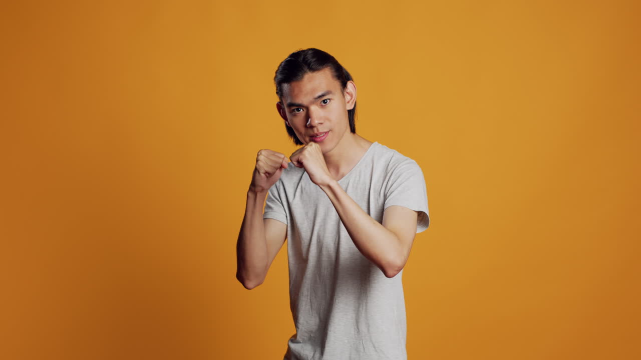 Furious person clenching fists and acting angry