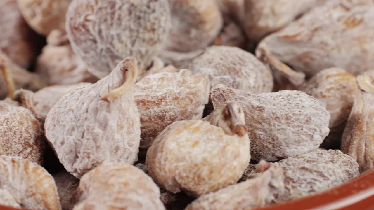Dried organic figs fruits close-up macro. Dry healthy ingredient. Health dietary food concept. High quality 4k footage