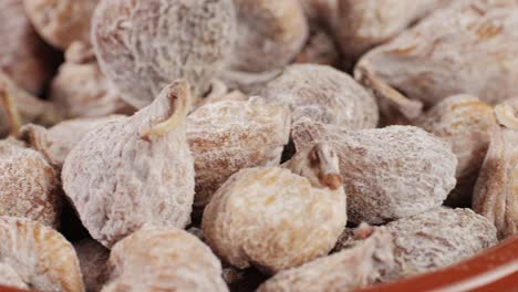 Dried organic figs fruits close-up macro. Dry healthy ingredient. Health dietary food concept. High quality 4k footage