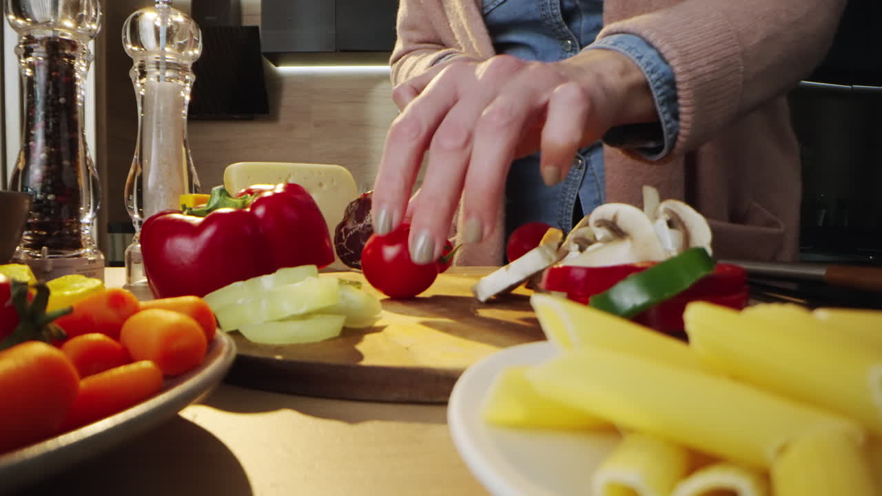 Preparing food with vegetables and pasta