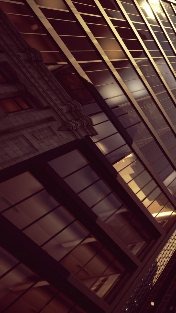 Buildings reflect light during sunset in an urban setting