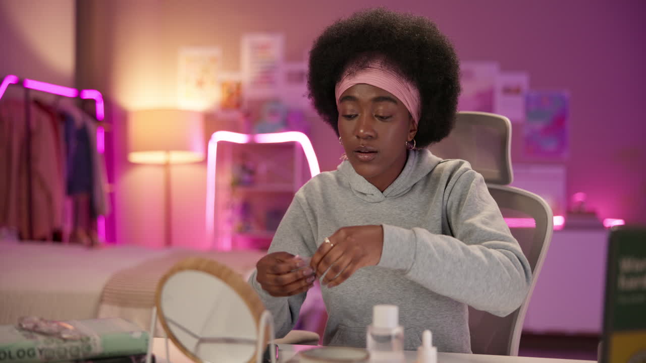 Young Woman Applying Makeup