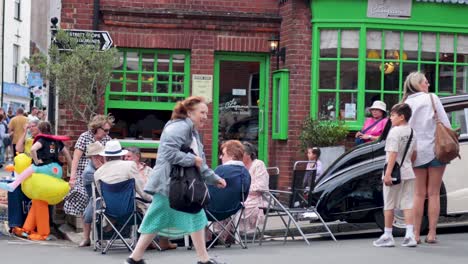 community gathering with chairs and vintage car