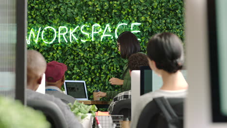 woman gives work presentation on laptop