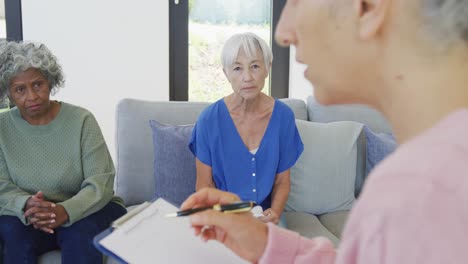 Senior-diverse-people-at-meeting-talking-at-retirement-home