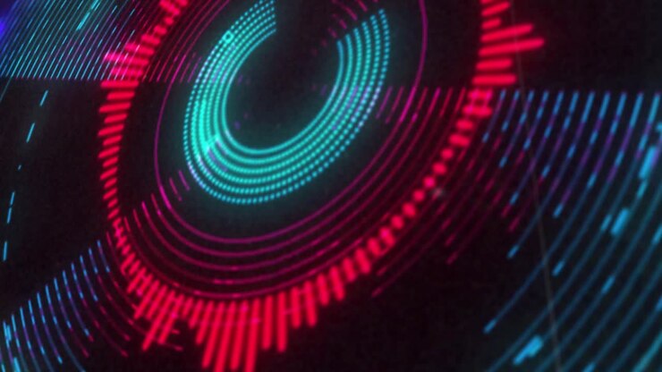 Animation of circular red and purple 3d light display flashing and rotating on black background