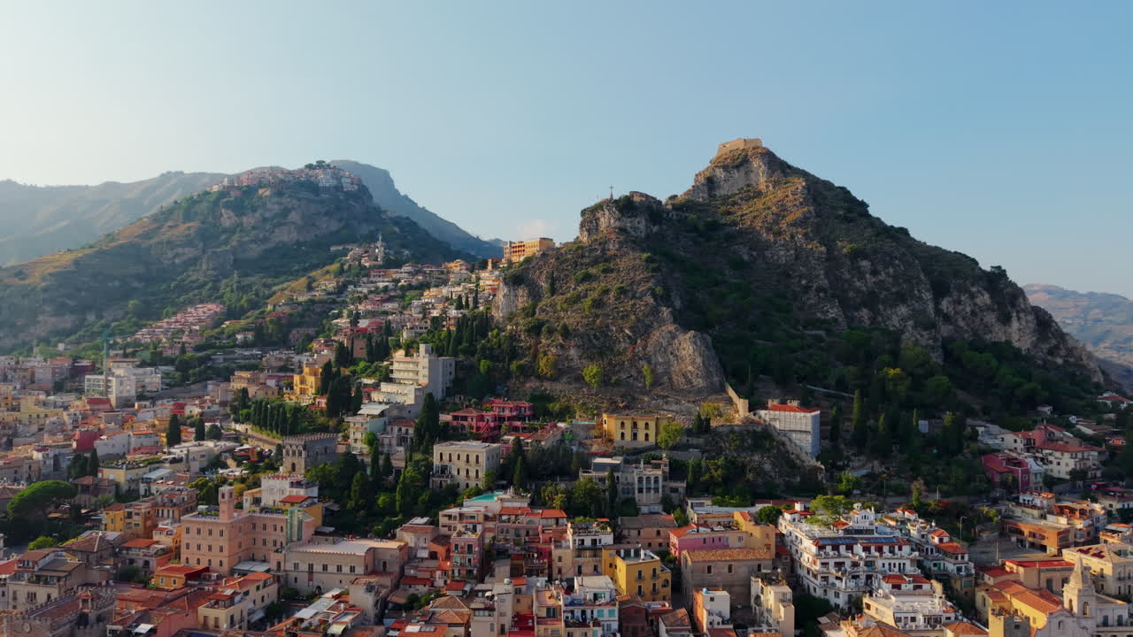 Scenic view of Taormina's hills and buildings in Sicily, Italy