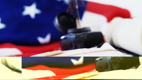 Quill-feather-and-ink-pot-with-legal-documents-arranged-on-table