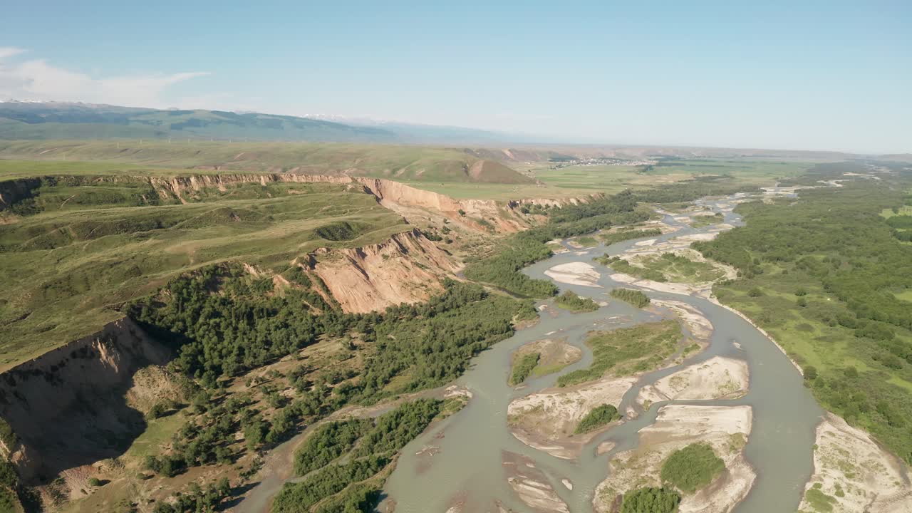 Grassland and river in a cloudy day.