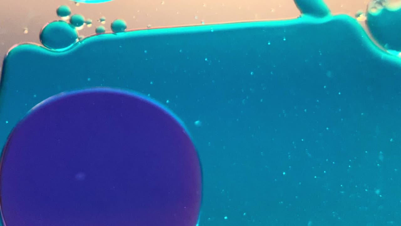 Pink and blue bubbles dropping down