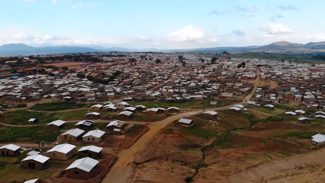 Rural Village in Malawi, Africa, Aerial Dolly in View