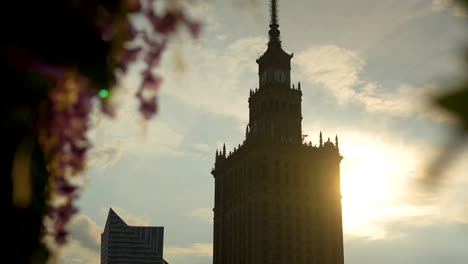 stunning shot of the palace of culture and science in warsaw during the setting sun