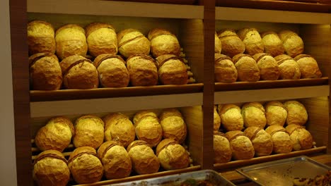 close up of a bread display in a bakery