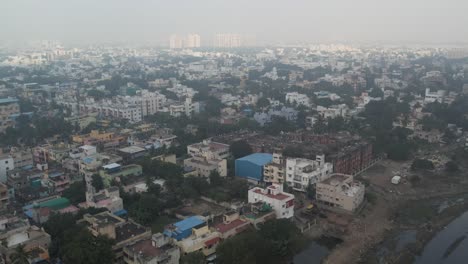 aerial video of anna nagar, aminjikarai, locals of an indian neighbourhood in chennai's metropolitan area, one of the most important commercials and slums