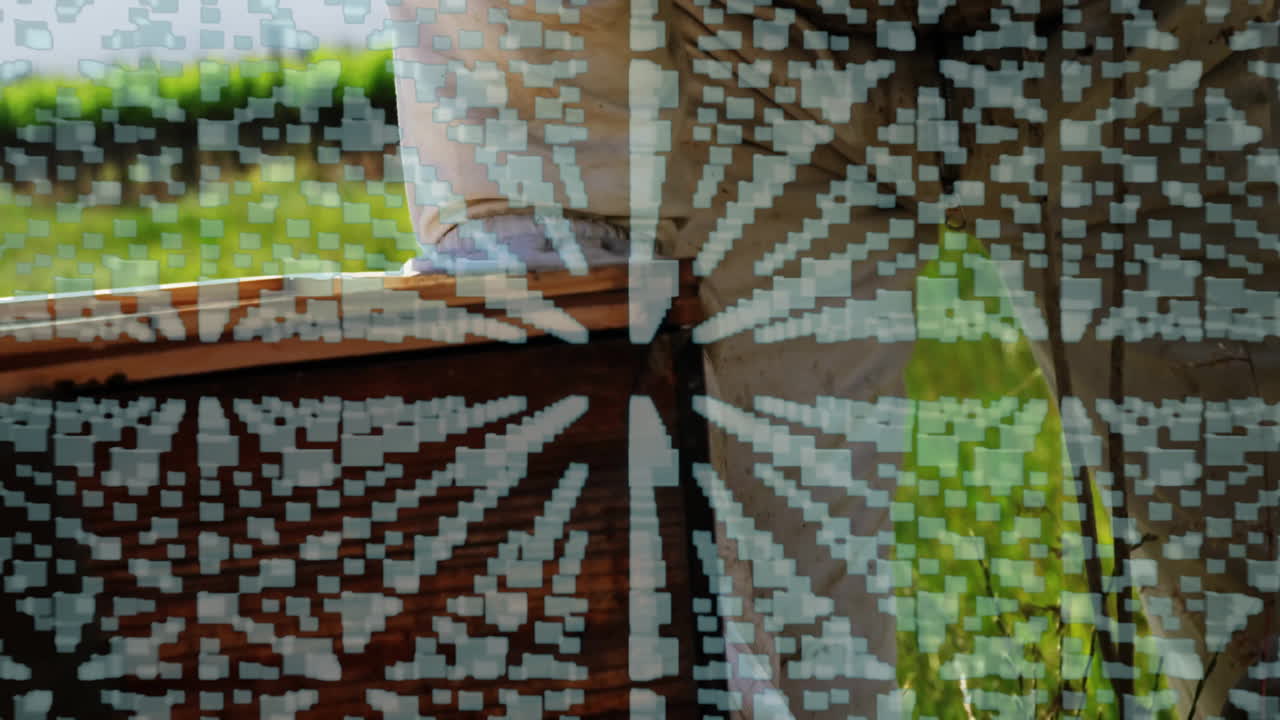 Person sitting on bench with digital data animation overlaying scene