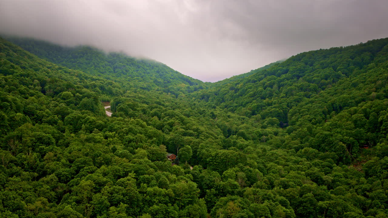 Drone gliding over the serene Smoky Mountains.