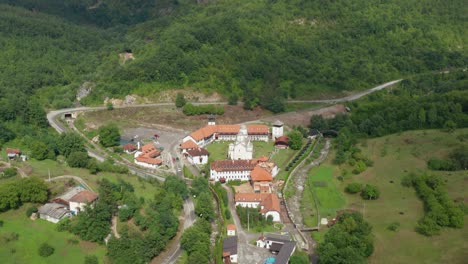 aerial shot flying over the mileseva monastery in serbia near prijepolje