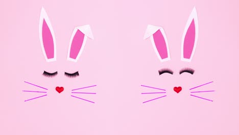 doble conejo de pascua creativo en fondo rosado pastel.