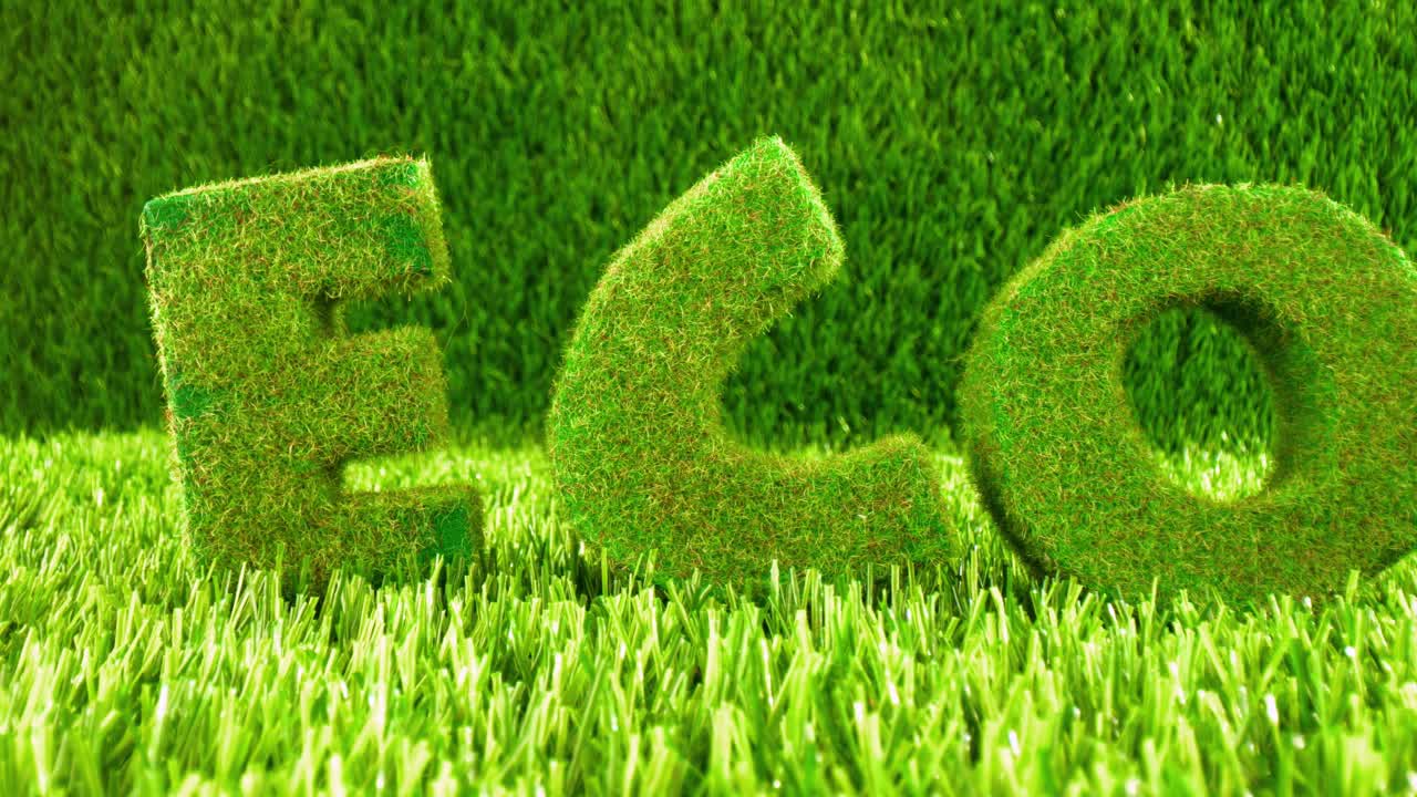 Letters on the green grass. Eco concept background.