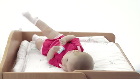 little pretty baby playing on