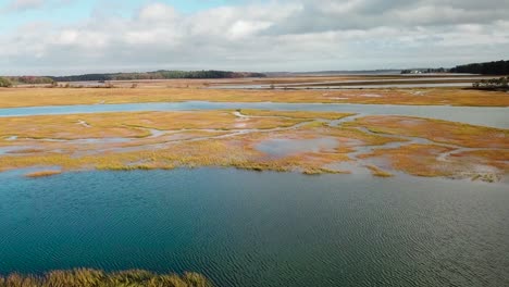 Aerial over vast bogs along the Nonesuch River near Portland Maine New England 5