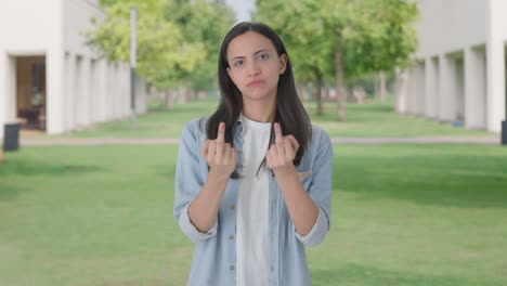 angry indian girl showing middle finger