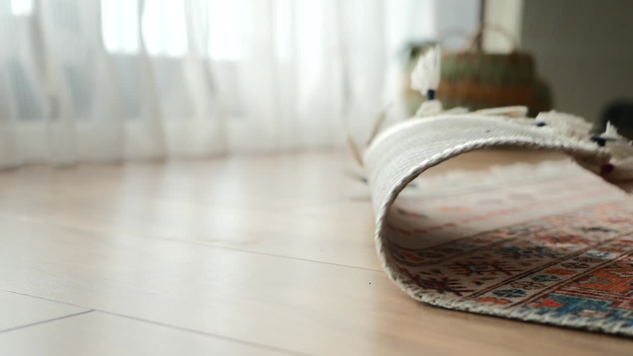 Home interior with a patterned rug on a wooden floor